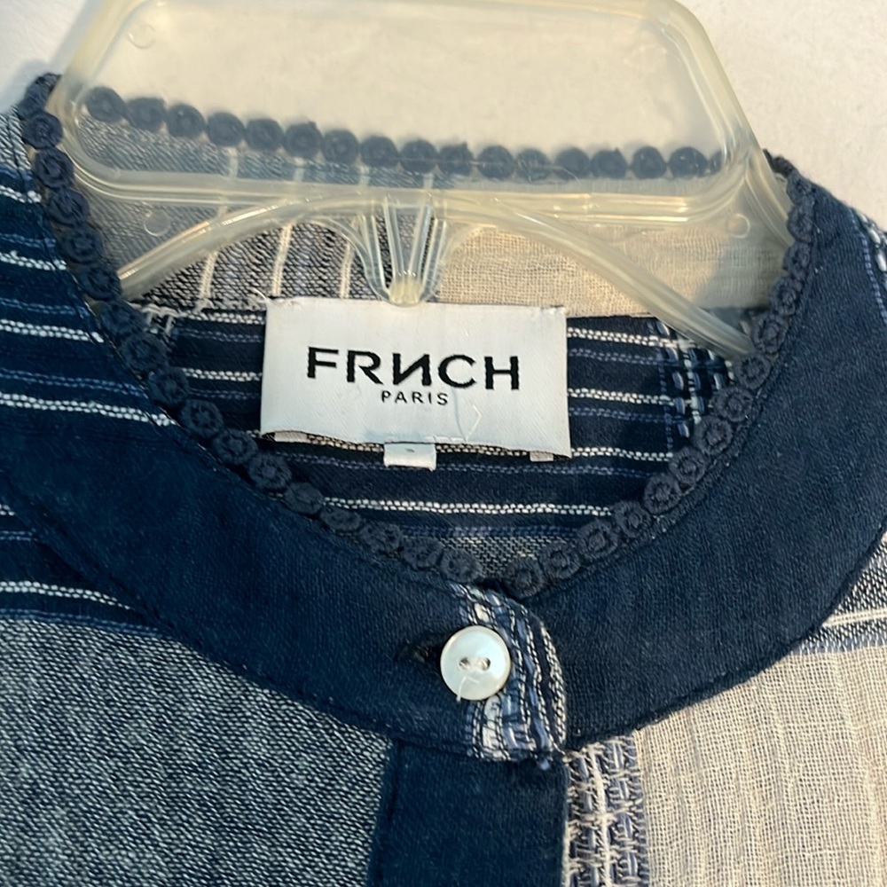 FRNCH shirt with ruffled bodice placket.